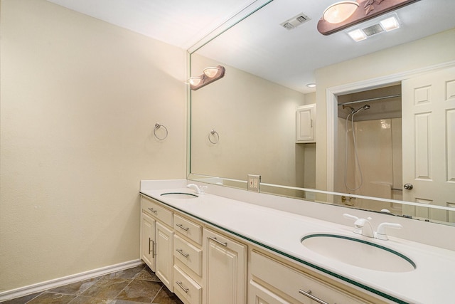 7324 Old Mill Run, Fort Worth, TX 76133 - full bathroom with a sink, double vanity, baseboards, and visible vents