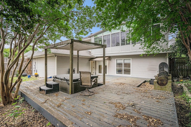 7324 Old Mill Run, Fort Worth, TX 76133 - rear view of house featuring a wooden deck, a sunroom, and fence