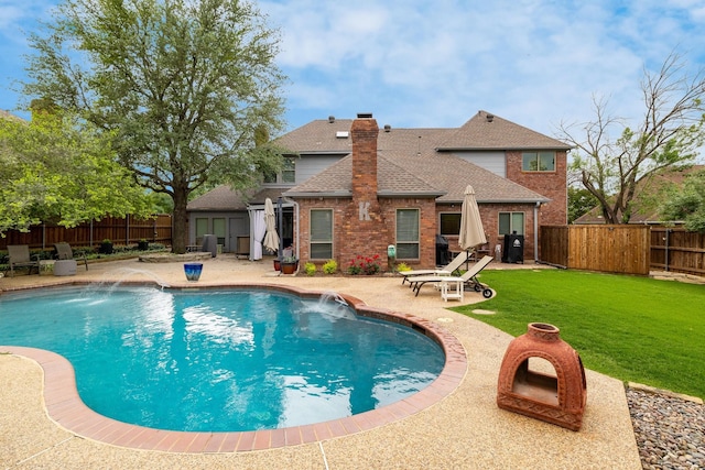 view of pool with a patio, a fenced backyard, a lawn, and a fenced in pool