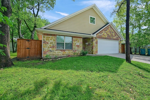 717 S Elm St, Sherman, TX 75090 - view of front of property featuring concrete driveway, stone siding, a front yard, and an attached garage