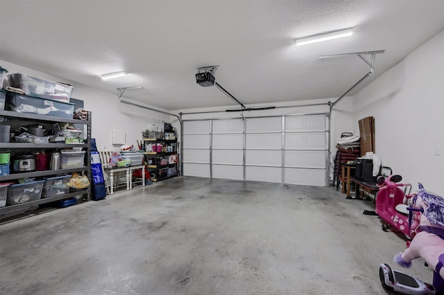 717 S Elm St, Sherman, TX 75090 - garage featuring a garage door opener