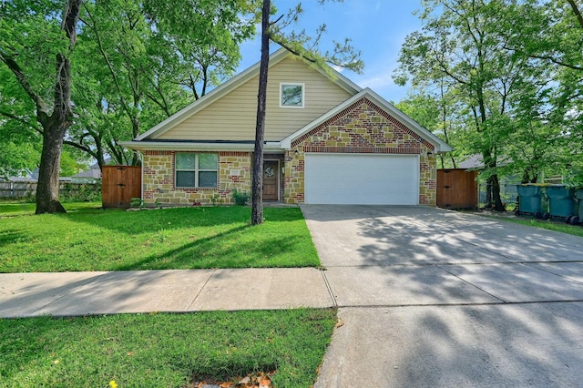 717 S Elm St, Sherman, TX 75090 - view of front of home featuring concrete driveway, a front yard, an attached garage, and fence