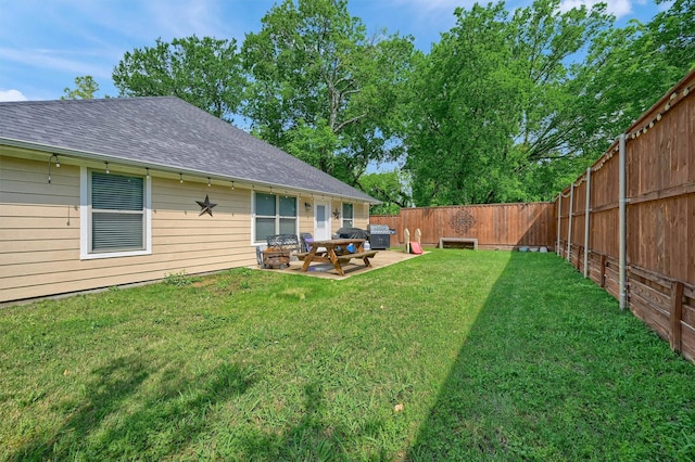 717 S Elm St, Sherman, TX 75090 - view of yard featuring a patio and a fenced backyard