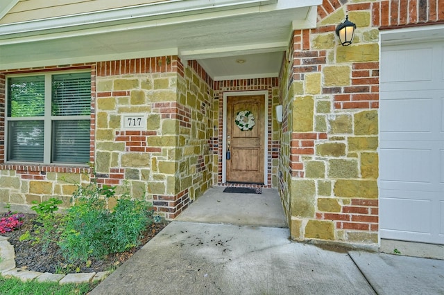 717 S Elm St, Sherman, TX 75090 - doorway to property featuring brick siding