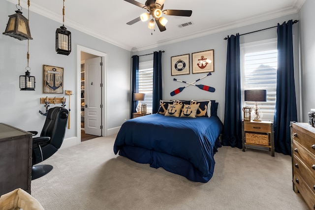 bedroom featuring visible vents, ornamental molding, light carpet, and ceiling fan