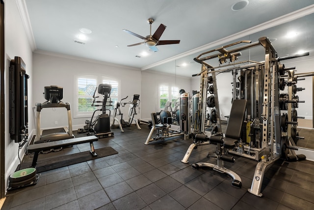 gym featuring ornamental molding, ceiling fan, and visible vents
