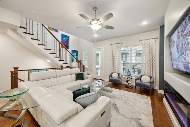 8218 Laflin Ln, Dallas, TX 75231 - living room featuring a ceiling fan, stairs, wood finished floors, baseboards, and recessed lighting