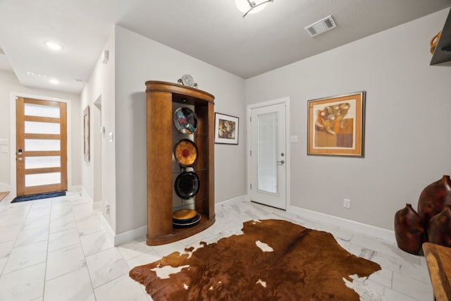 8218 Laflin Ln, Dallas, TX 75231 - entryway featuring visible vents, marble finish floor, and baseboards
