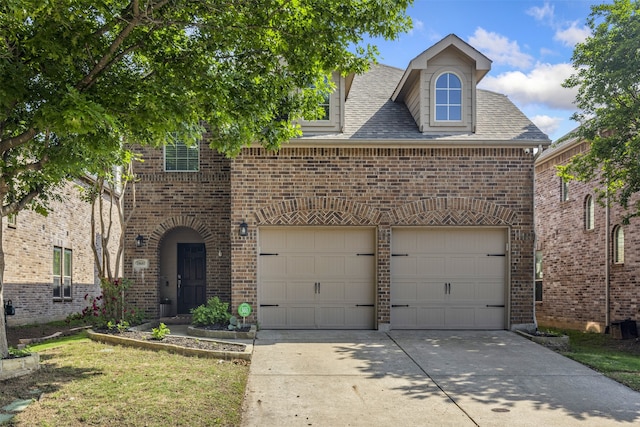 traditional-style home with concrete driveway, brick siding, a shingled roof, and a garage