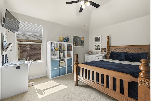 carpeted bedroom featuring a ceiling fan, baseboards, and vaulted ceiling