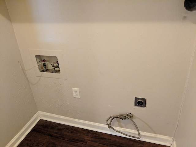 washroom with hookup for an electric dryer, dark wood-style flooring, laundry area, hookup for a washing machine, and baseboards
