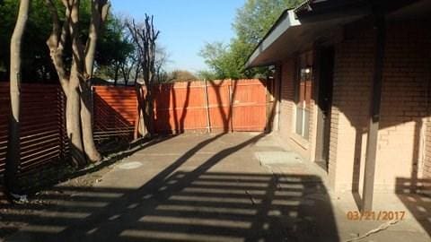 exterior space featuring fence