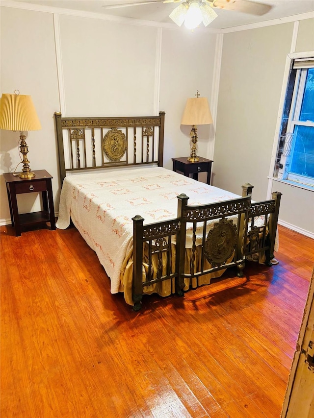 1406 N Main St, Weatherford, TX 76086 - bedroom featuring wood finished floors and crown molding