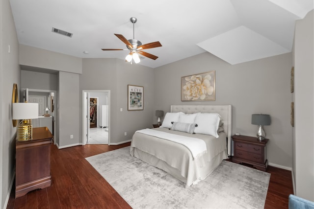 bedroom featuring baseboards, visible vents, wood finished floors, and a ceiling fan