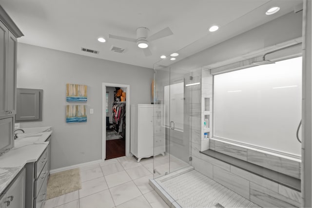 bathroom with ceiling fan, recessed lighting, visible vents, and a stall shower