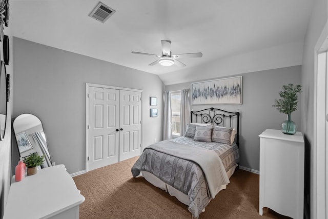 carpeted bedroom featuring baseboards, visible vents, ceiling fan, and a closet