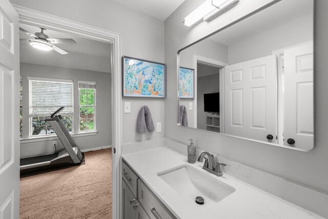 bathroom featuring ceiling fan and vanity