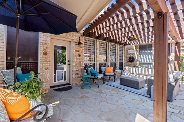 view of patio / terrace with an outdoor living space and a pergola