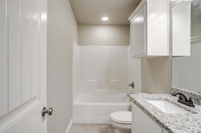 full bath with toilet, vanity, tile patterned floors, and baseboards