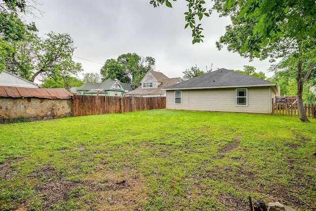 view of yard featuring a fenced backyard