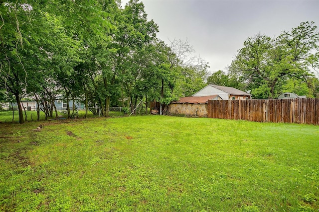 view of yard with fence