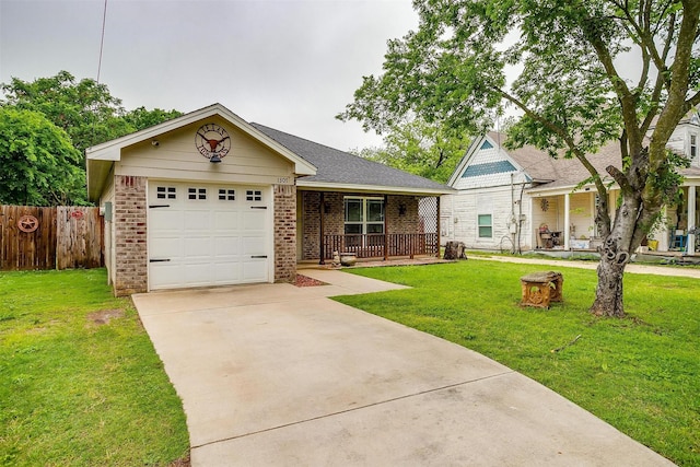 ranch-style home featuring a porch, a front yard, and brick siding