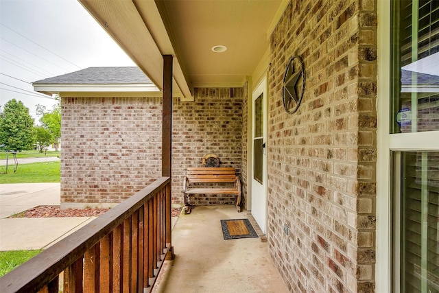 view of patio / terrace with a porch and wine cooler