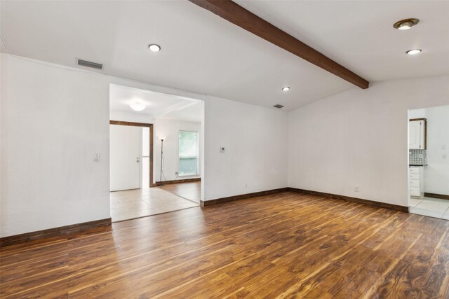 unfurnished room featuring visible vents, recessed lighting, and wood finished floors