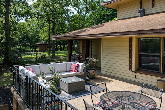 view of patio with an outdoor hangout area and outdoor dining space
