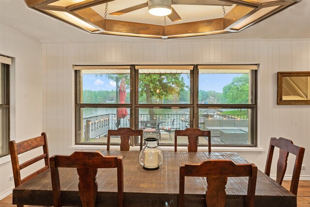 dining room featuring wood finished floors and ceiling fan