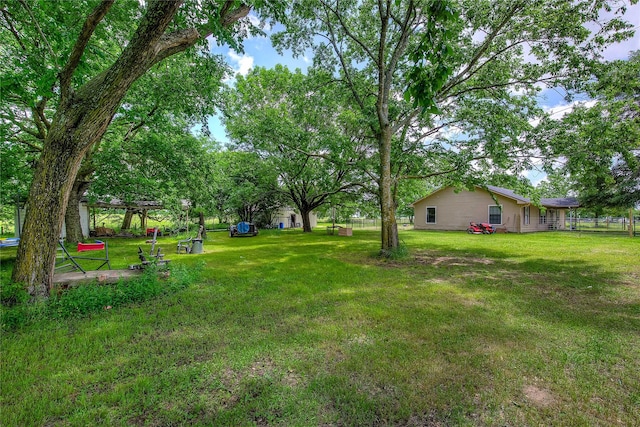 1829 County Road 1103, Sulphur Springs, TX 75482 - living area with wood finished floors, ceiling fan, baseboards, and recessed lighting