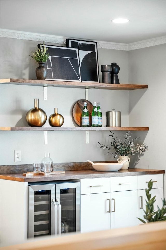 bar with wine cooler and a dry bar