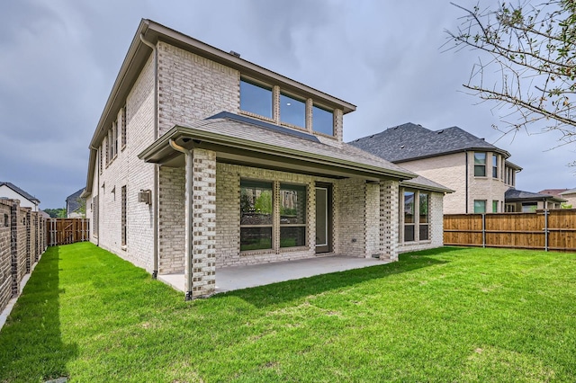 16090 Inca Dove Ct, Frisco, TX 75035 - back of property with brick siding and a patio area