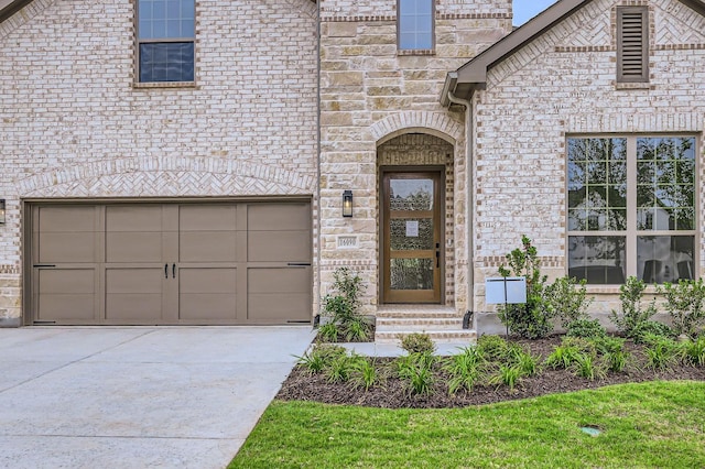 16090 Inca Dove Ct, Frisco, TX 75035 - property entrance with driveway and an attached garage