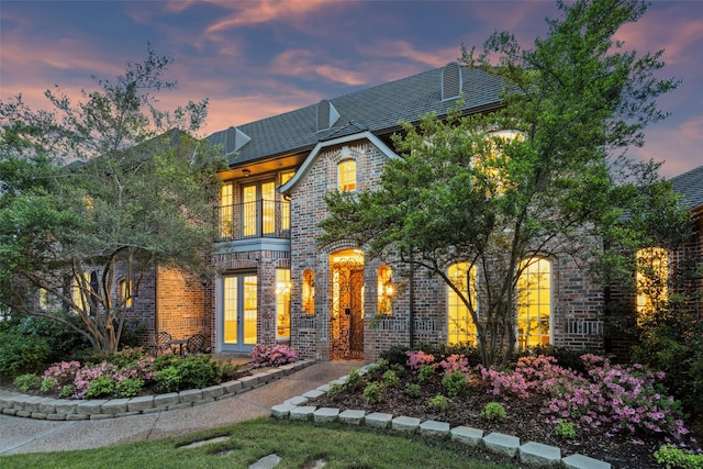 7307 Stallion Cir, Flower Mound, TX 75022 - french country style house featuring a lawn and brick siding