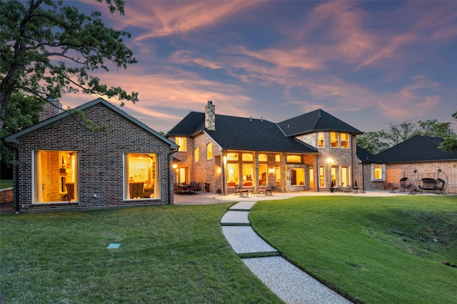 7307 Stallion Cir, Flower Mound, TX 75022 - pool featuring a lawn, an in ground hot tub, a patio area, and an outbuilding