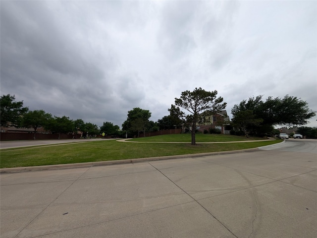 view of road featuring curbs