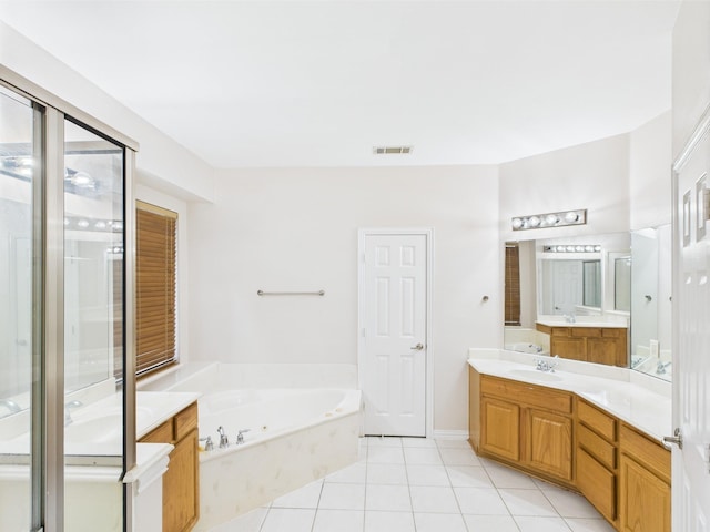 1264 Carriage Creek Dr, Desoto, TX 75115 - bathroom with tile patterned floors, a bath, a stall shower, and vanity