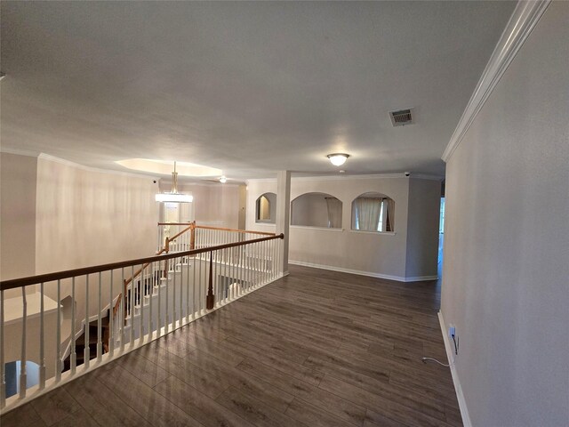 1264 Carriage Creek Dr, Desoto, TX 75115 - corridor with crown molding, baseboards, wood finished floors, and an upstairs landing