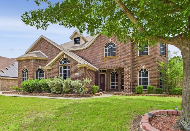 1264 Carriage Creek Dr, Desoto, TX 75115 - view of front of property featuring brick siding and a front lawn