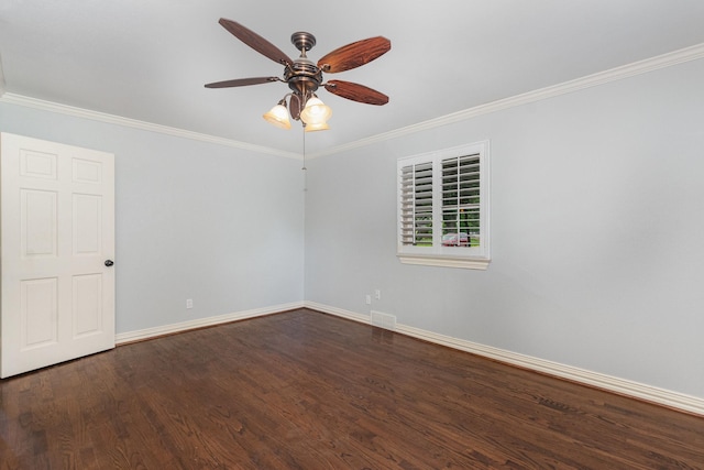 unfurnished room featuring a ceiling fan, baseboards, dark wood-type flooring, visible vents, and ornamental molding