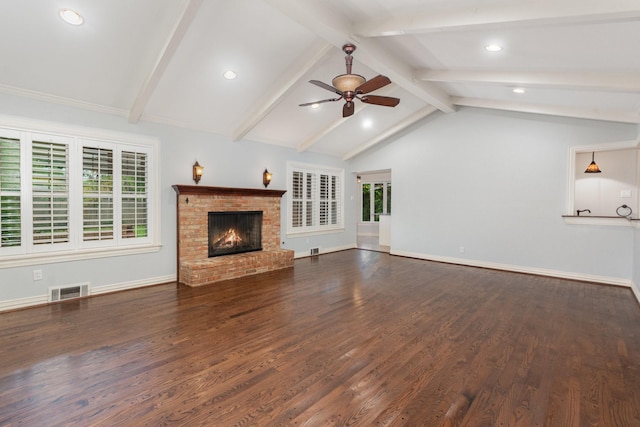 unfurnished living room featuring visible vents, a brick fireplace, ceiling fan, recessed lighting, and lofted ceiling with beams