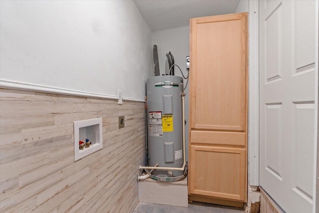 utility room with water heater