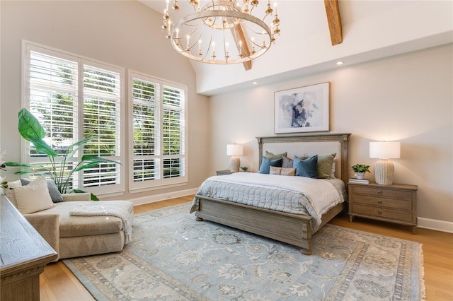 5409 Twin Cities Ln, Mckinney, TX 75070 - bedroom featuring a chandelier, vaulted ceiling, wood finished floors, and baseboards