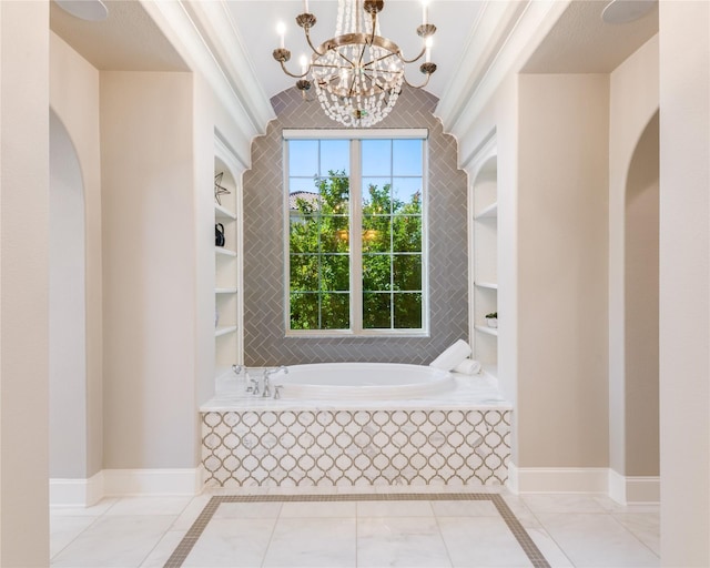 5409 Twin Cities Ln, Mckinney, TX 75070 - full bath featuring built in shelves, a chandelier, a garden tub, and baseboards