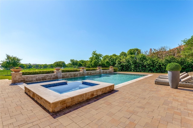 5409 Twin Cities Ln, Mckinney, TX 75070 - view of swimming pool with a patio and a pool with connected hot tub