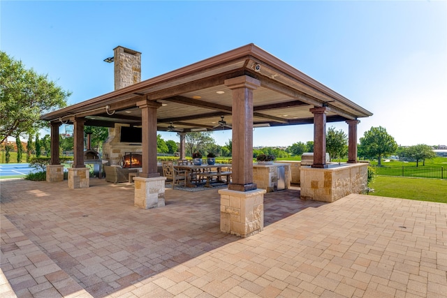 5409 Twin Cities Ln, Mckinney, TX 75070 - view of home's community featuring a patio area, exterior kitchen, fence, and a gazebo