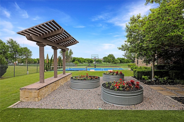 5409 Twin Cities Ln, Mckinney, TX 75070 - view of yard with community basketball court and a pergola