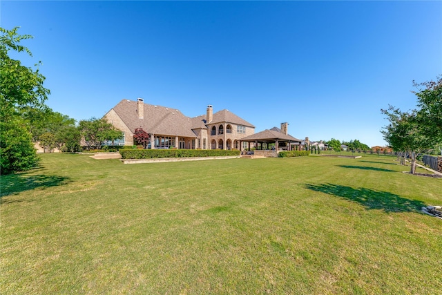 5409 Twin Cities Ln, Mckinney, TX 75070 - view of grassy yard with a gazebo