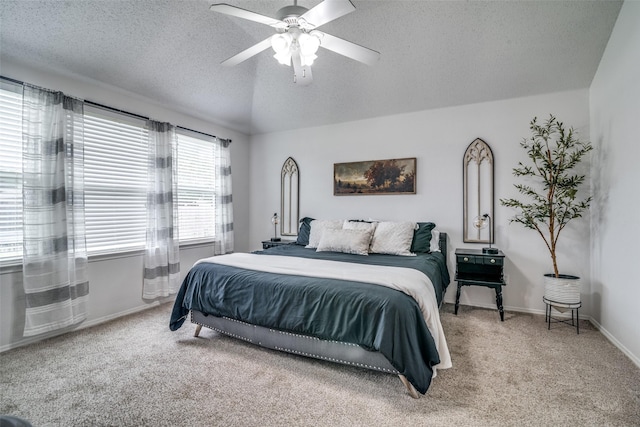 bedroom featuring baseboards, carpet, a textured ceiling, and a ceiling fan